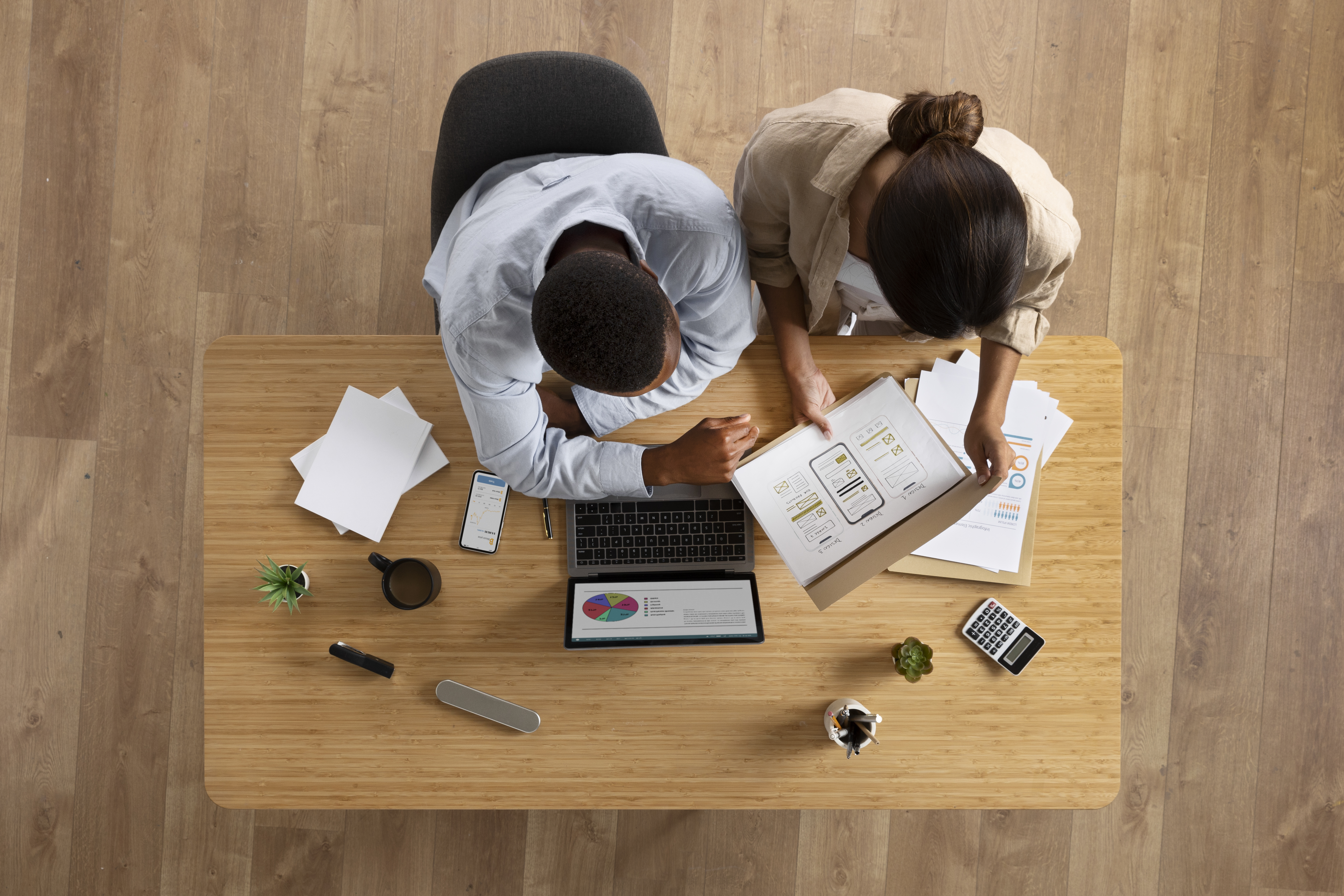 Colleagues working together top view